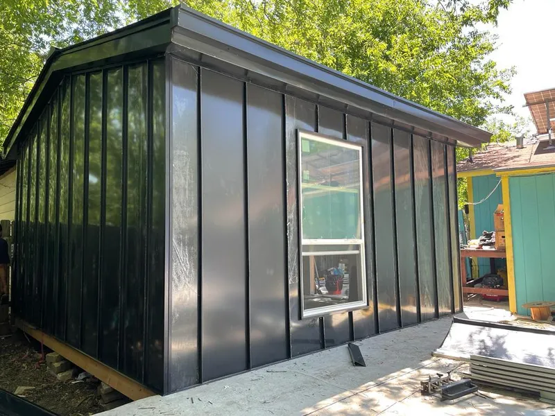 Black standing seam metal wall panels for Roof Inspection in Upper St. Clair